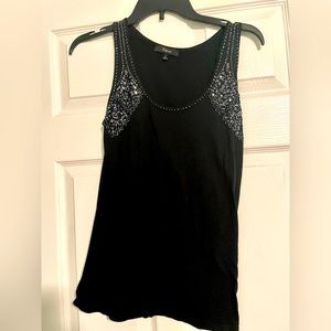 Black Express tank with silver bearing
